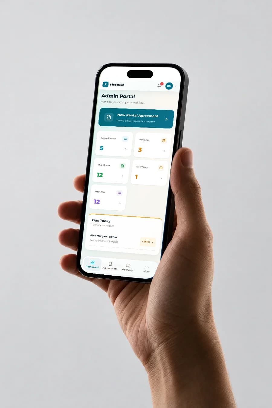 A hand holding a phone showing FleetHub with demo fleet details